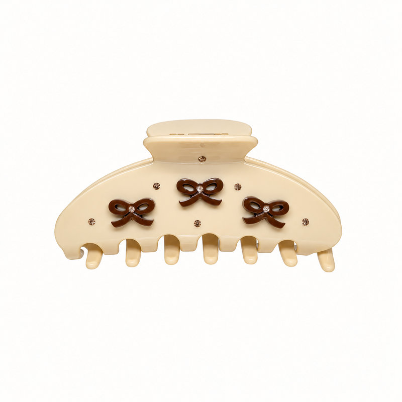 THE LAUREN CREAM BOW ACETATE CLAW CLIP